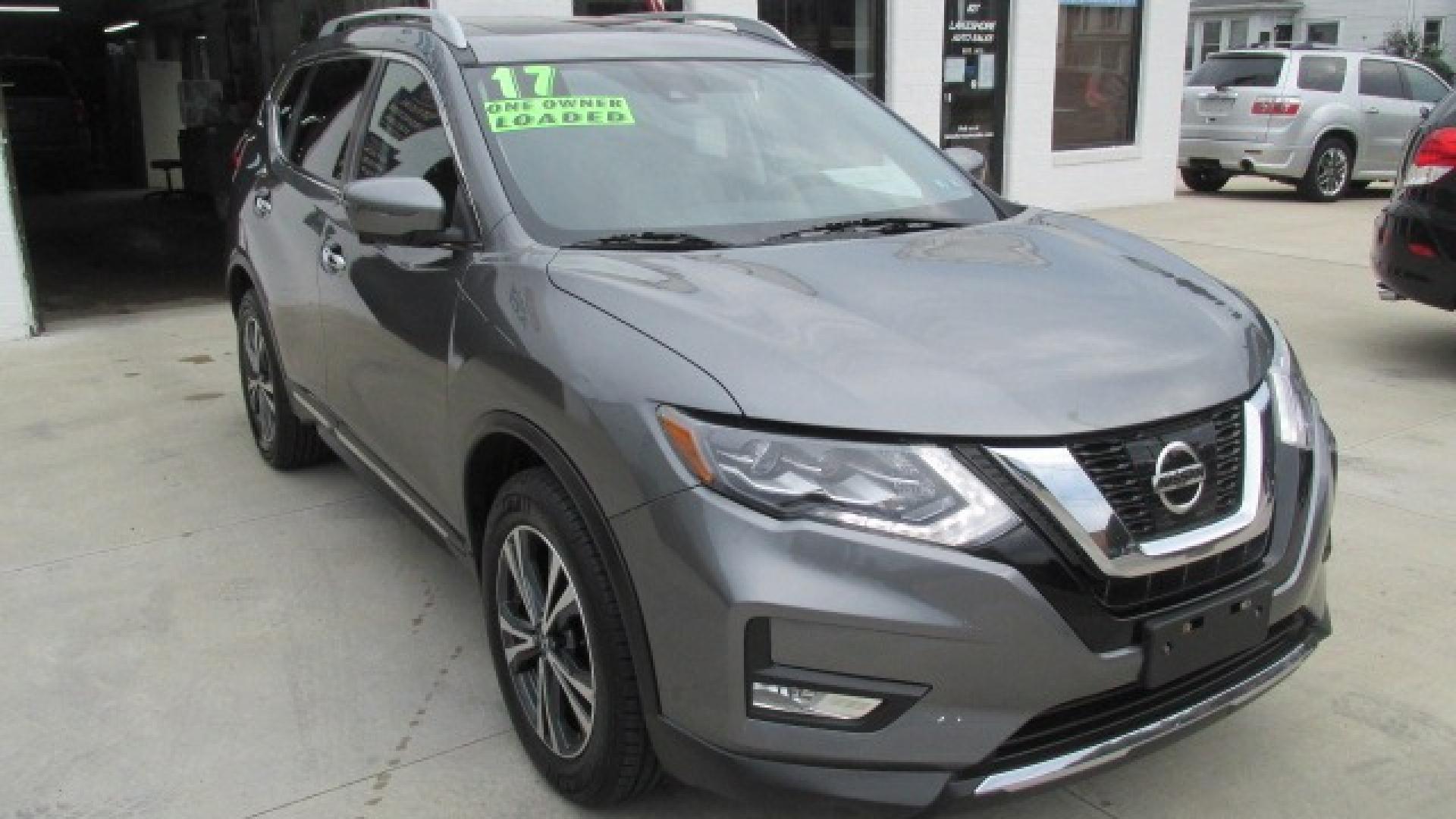 2017 Granite Metallic /Black Nissan Rogue SL (5N1AT2MV5HC) with an 2.5L L4 DOHC 16V engine, Continuously Variable Transmission transmission, located at 827 W 26th Street, Erie, PA, 16508, (814) 455-3401, 42.105431, -80.090942 - Thanks for looking at our one owner super clean new Nissan trade. This is the SL all-wheel drive with factory remote start, power seat, heated seats, leather seats, panoramic sunroof, back up camera, navigation, lane assist, Bluetooth, and lots more. A full service was just completed in our service - Photo#0