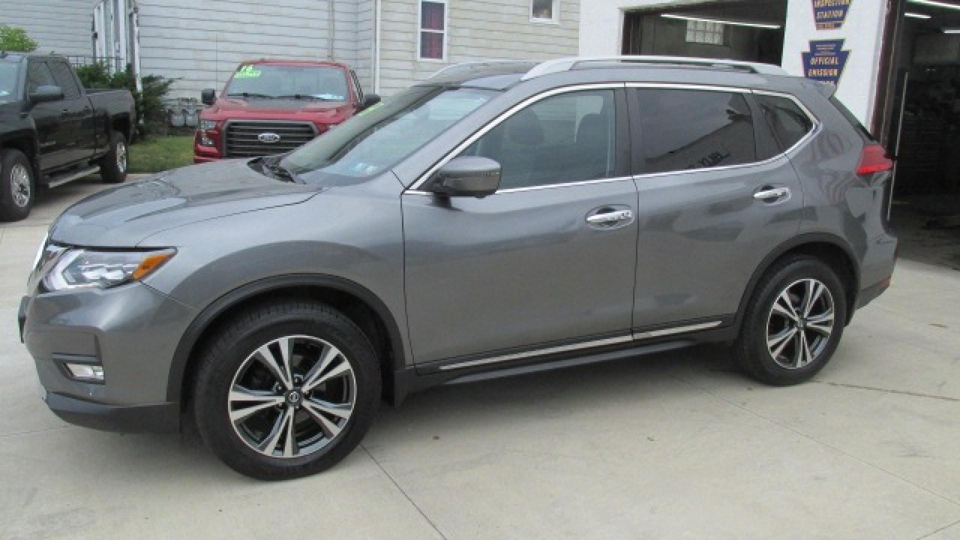 2017 Granite Metallic /Black Nissan Rogue SL (5N1AT2MV5HC) with an 2.5L L4 DOHC 16V engine, Continuously Variable Transmission transmission, located at 827 W 26th Street, Erie, PA, 16508, (814) 455-3401, 42.105431, -80.090942 - Thanks for looking at our one owner super clean new Nissan trade. This is the SL all-wheel drive with factory remote start, power seat, heated seats, leather seats, panoramic sunroof, back up camera, navigation, lane assist, Bluetooth, and lots lots more. A full service was just completed in our ser - Photo#6