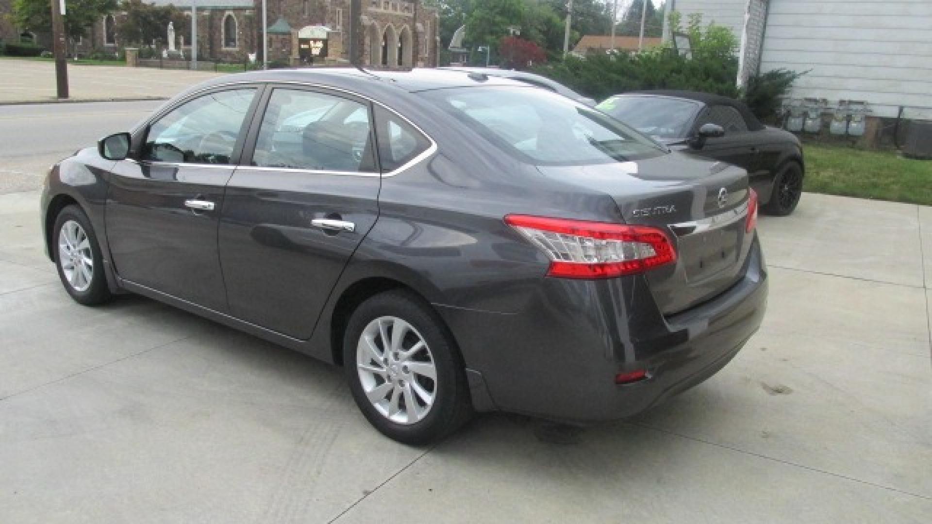 2013 Amethyst Gray /Graphite Nissan Sentra SV (3N1AB7AP0DL) with an 2.4L L4 DOHC 16V engine, 4-Speed Automatic Overdrive transmission, located at 827 W 26th Street, Erie, PA, 16508, (814) 455-3401, 42.105431, -80.090942 - Thanks for looking at our super clean rust-free new arrival. This is the S model with lots of options plus both keys and the factory floor mats plus it comes with a nonsmoker interior. A full service was just completed in our service department, and it also comes with almost new Michelin tires. What - Photo#4