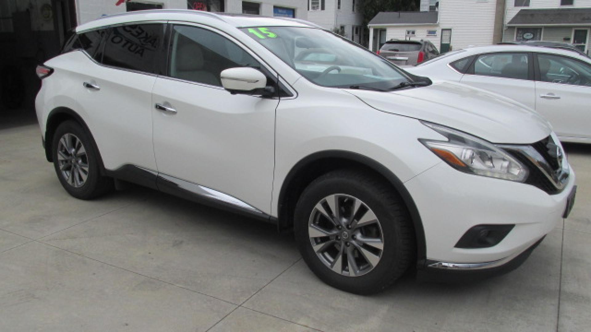 2015 Pearl White /Tan Nissan Murano SL (5N1AZ2MH0FN) with an 3.5L V6 DOHC 24V engine, Continuously Variable Transmission transmission, located at 827 W 26th Street, Erie, PA, 16508, (814) 455-3401, 42.105431, -80.090942 - Thanks for looking at our super clean nonsmoker new Nissan trade in. This is the SL model with lots of options including all wheel drive, heated leather seats, a panoramic sunroof, back up camera, navigation, factory remote start, push button start and lots more. A full service will be completed in - Photo#2