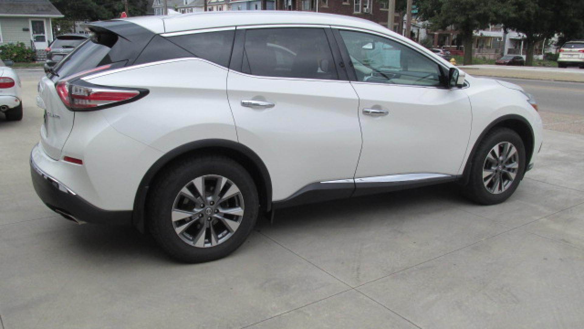 2015 Pearl White /Tan Nissan Murano SL (5N1AZ2MH0FN) with an 3.5L V6 DOHC 24V engine, Continuously Variable Transmission transmission, located at 827 W 26th Street, Erie, PA, 16508, (814) 455-3401, 42.105431, -80.090942 - Thanks for looking at our super clean nonsmoker new Nissan trade in. This is the SL model with lots of options including all wheel drive, heated leather seats, a panoramic sunroof, back up camera, navigation, factory remote start, push button start and lots more. A full service will be completed in - Photo#3