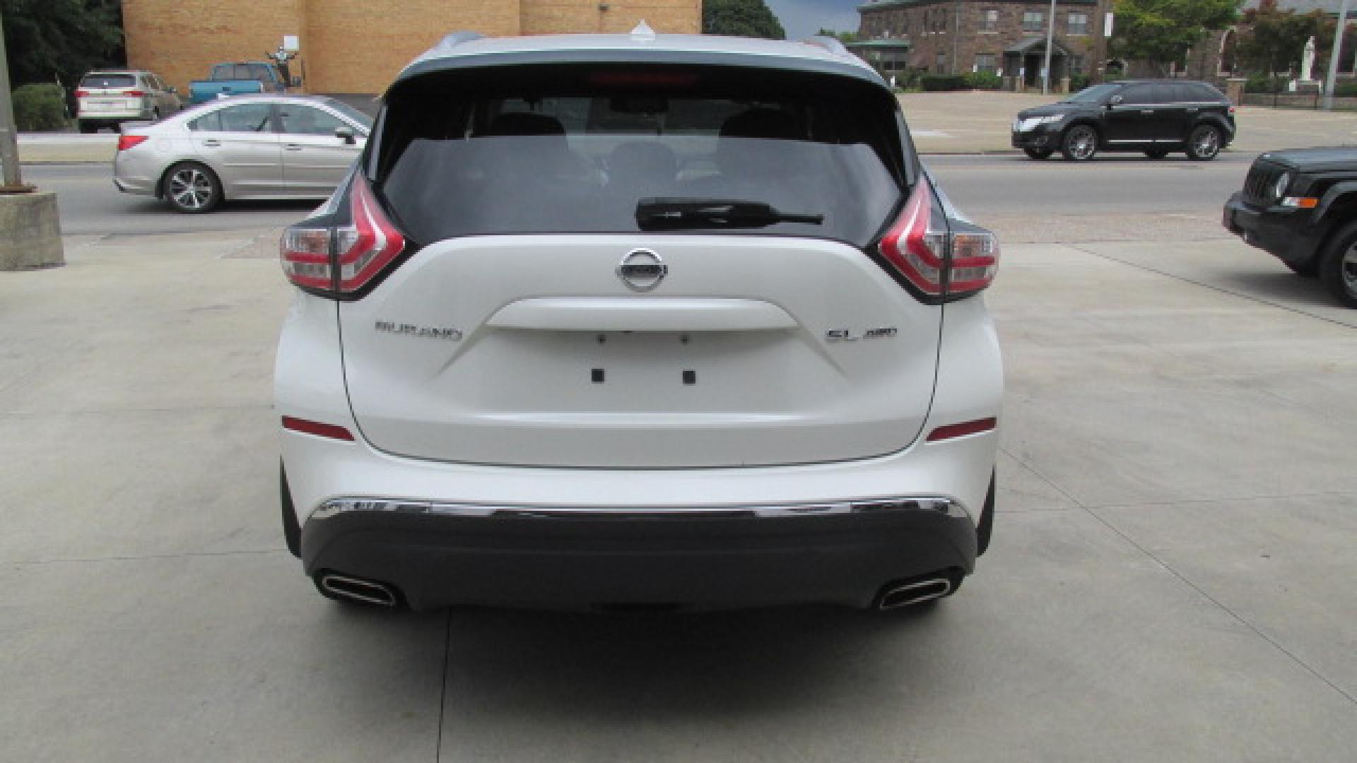 2015 Pearl White /Tan Nissan Murano SL (5N1AZ2MH0FN) with an 3.5L V6 DOHC 24V engine, Continuously Variable Transmission transmission, located at 827 W 26th Street, Erie, PA, 16508, (814) 455-3401, 42.105431, -80.090942 - Thanks for looking at our super clean nonsmoker new Nissan trade in. This is the SL model with lots of options including all wheel drive, heated leather seats, a panoramic sunroof, back up camera, navigation, factory remote start, push button start and lots more. A full service will be completed in - Photo#4