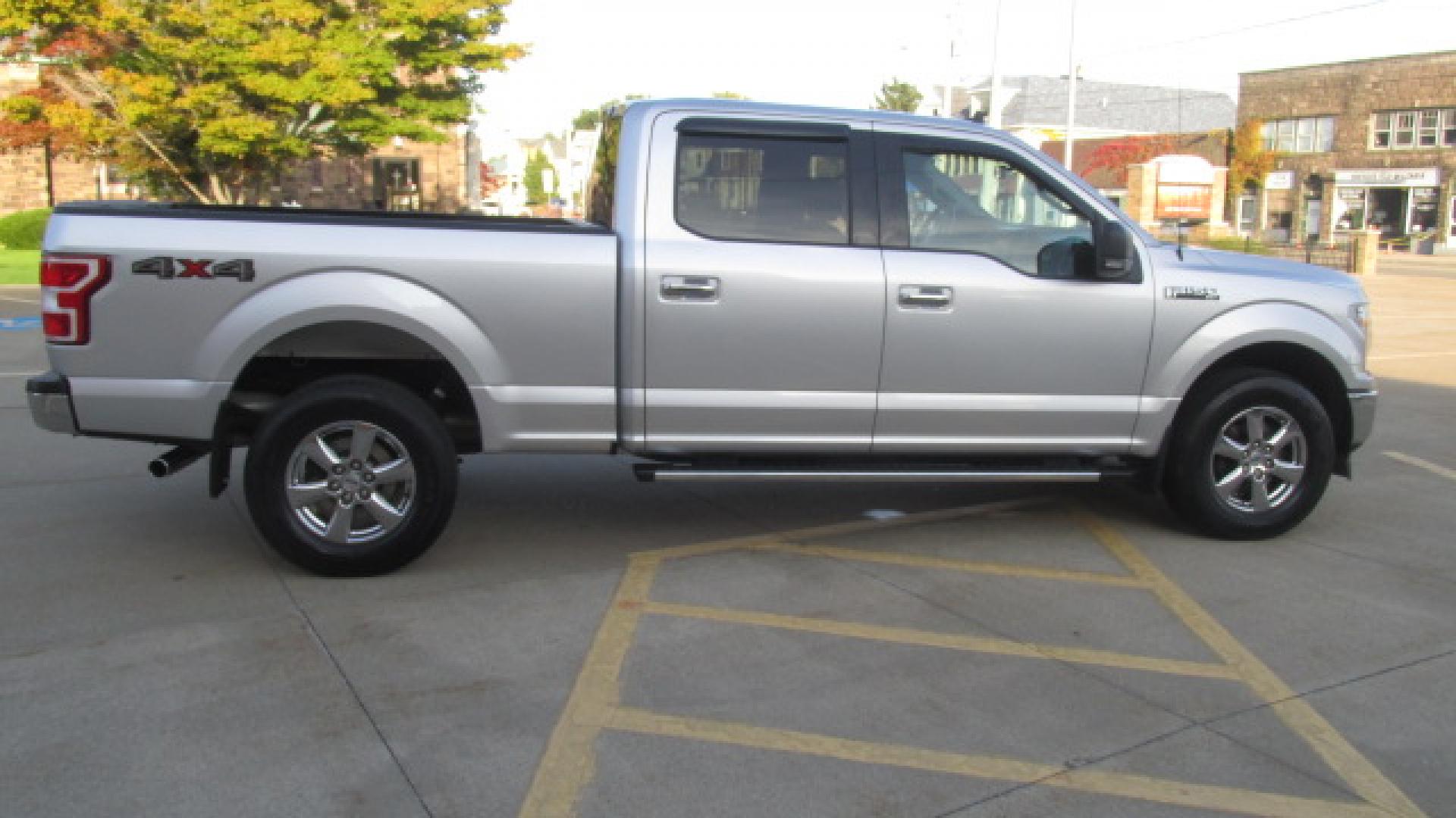 2019 Ingot Silver /Medium Gray Ford F-150 XLT (1FTFW1E57KF) with an 5.0L V8 OHV 16V engine, 10 speed automatic transmission, located at 827 W 26th Street, Erie, PA, 16508, (814) 455-3401, 42.105431, -80.090942 - Thanks for looking at our ONE OWNER, ACCIDENT AND RUST-FREE new Ford truck trade. What a like new truck this is despite the miles and as you can see by the pictures the one and only owner kept this truck like new and he kept up on the service. If you're looking for the cleanest one of these around - Photo#2