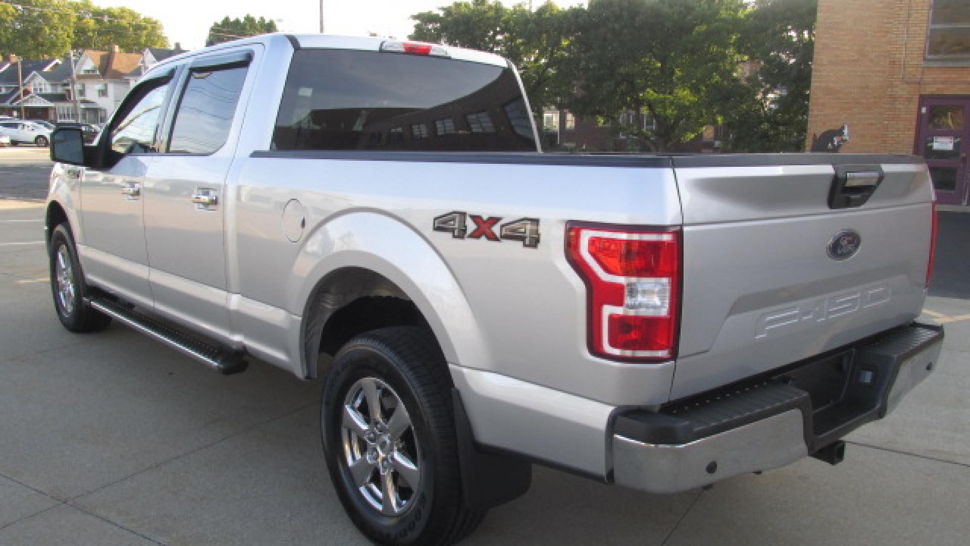 2019 Ingot Silver /Medium Gray Ford F-150 XLT (1FTFW1E57KF) with an 5.0L V8 OHV 16V engine, 10 speed automatic transmission, located at 827 W 26th Street, Erie, PA, 16508, (814) 455-3401, 42.105431, -80.090942 - Thanks for looking at our ONE OWNER, ACCIDENT AND RUST-FREE new Ford truck trade. What a like new truck this is despite the miles and as you can see by the pictures the one and only owner kept this truck like new and he kept up on the service. If you're looking for the cleanest one of these around - Photo#5