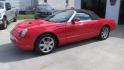 2002 Torch Red /Two Tone Red & Black Ford Thunderbird Premiunm (1FAHP60AX2Y) with an 3.9L V8 DOHC 32V engine, 5-Speed Automatic Overdrive transmission, located at 827 W 26th Street, Erie, PA, 16508, (814) 455-3401, 42.105431, -80.090942 - Thanks for looking at our super clean accident-free Florida owned new arrival. This is the Premium edition with the two-tone seats, door panels, lower dash plus leather seating, and it also comes with a like new interior. This car also comes with the hard top and stand, the parade boot, owner's manu - Photo#5