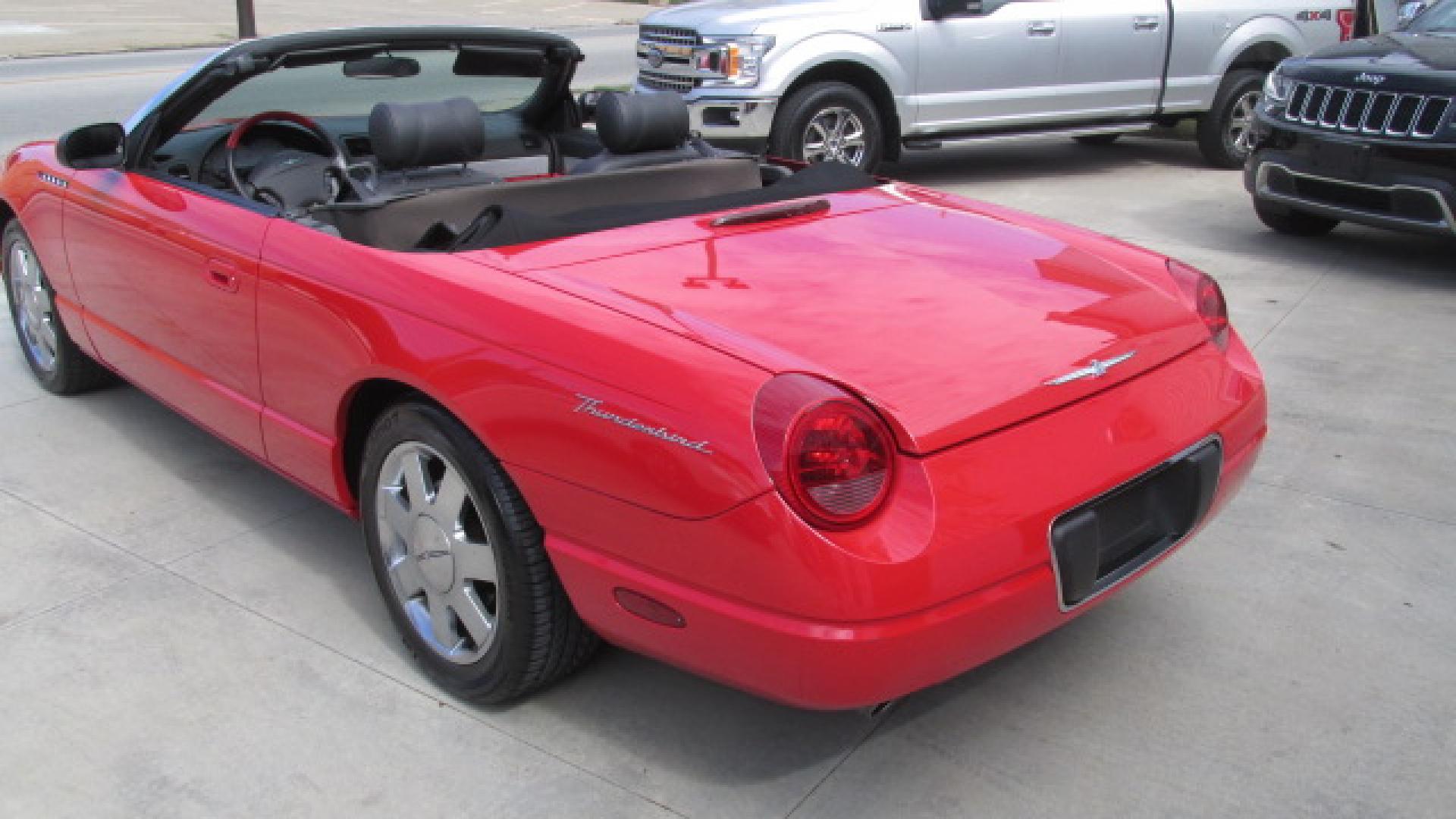 2002 Torch Red /Two Tone Red & Black Ford Thunderbird Premiunm (1FAHP60AX2Y) with an 3.9L V8 DOHC 32V engine, 5-Speed Automatic Overdrive transmission, located at 827 W 26th Street, Erie, PA, 16508, (814) 455-3401, 42.105431, -80.090942 - Thanks for looking at our super clean accident-free Florida owned new arrival. This is the Premium edition with the two-tone seats, door panels, lower dash plus leather seating, and it also comes with a like new interior. This car also comes with the hard top and stand, the parade boot, owner's manu - Photo#9