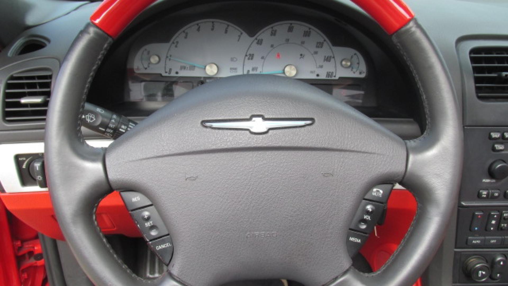 2002 Torch Red /Two Tone Red & Black Ford Thunderbird Premiunm (1FAHP60AX2Y) with an 3.9L V8 DOHC 32V engine, 5-Speed Automatic Overdrive transmission, located at 827 W 26th Street, Erie, PA, 16508, (814) 455-3401, 42.105431, -80.090942 - Thanks for looking at our super clean accident-free Florida owned new arrival. This is the Premium edition with the two-tone seats, door panels, lower dash plus leather seating, and it also comes with a like new interior. This car also comes with the hard top and stand, the parade boot, owner's manu - Photo#20