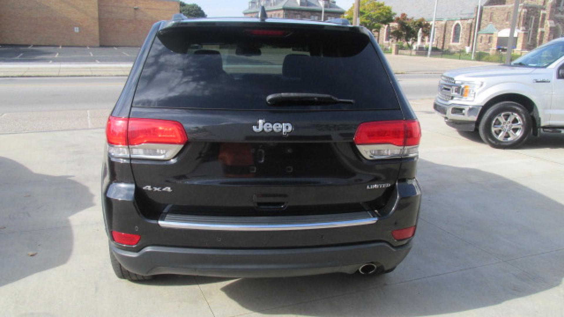 2016 Black Crystal Pearlcoat /Jet Black Jeep Grand Cherokee Limited (1C4RJFBG1GC) with an 3.6L V6 DOHC 24V engine, 8-Speed Automatic transmission, located at 827 W 26th Street, Erie, PA, 16508, (814) 455-3401, 42.105431, -80.090942 - Thanks for looking at our two-owner accident and rust-free new Jeep trade. This is the Limited model with lots of options including heated leather front and second row seats, a power sunroof, factory remote start, keyless entry with push button start, power lift gate, Bluetooth, backup camera and lo - Photo#4