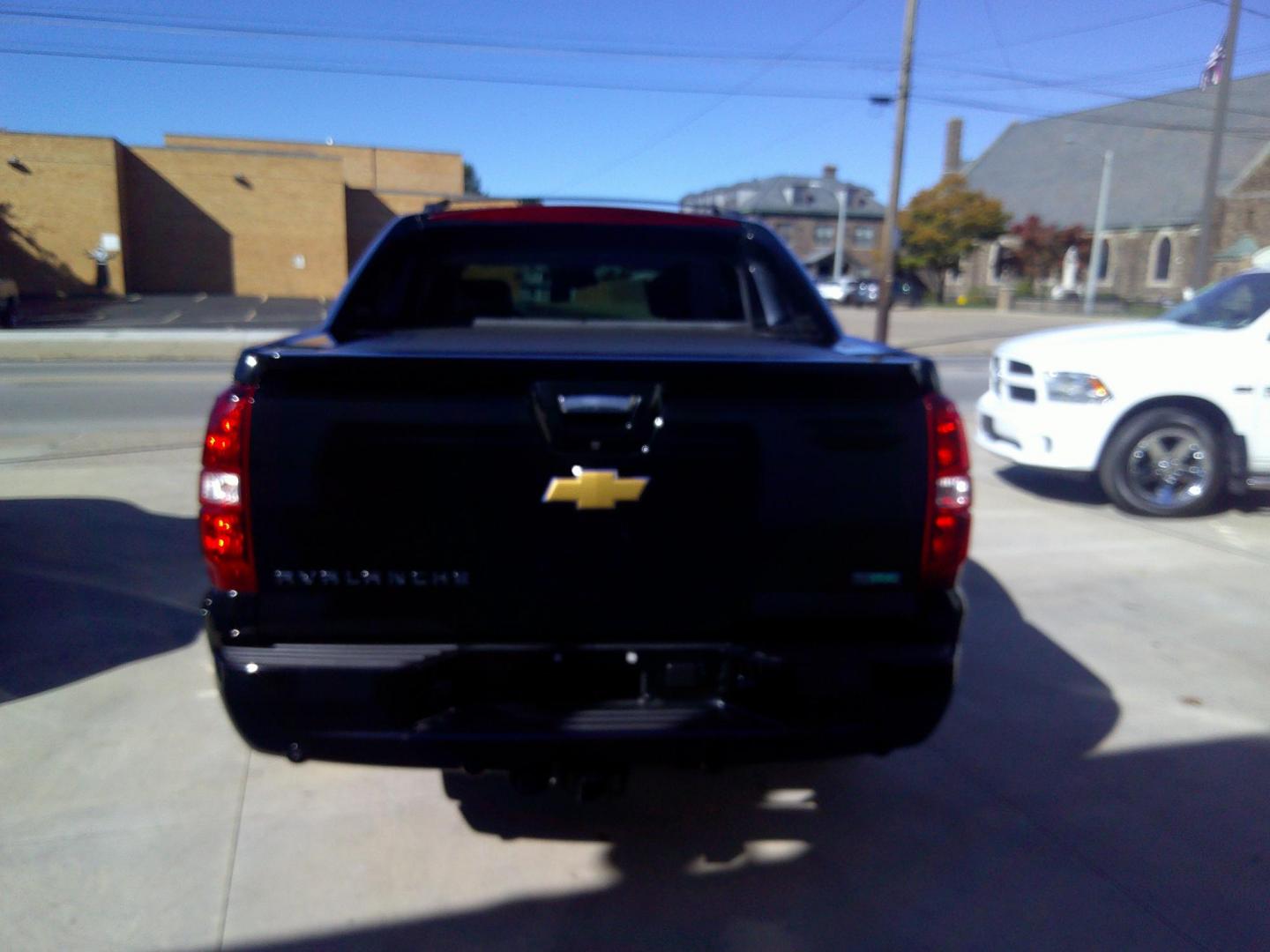 2012 Black /Black Chevrolet Avalanche LTZ 4WD (3GNTKGE71CG) with an 5.3L V8 OHV 16V FFV engine, 4-Speed Automatic transmission, located at 827 W 26th Street, Erie, PA, 16508, (814) 455-3401, 42.105431, -80.090942 - Photo#4