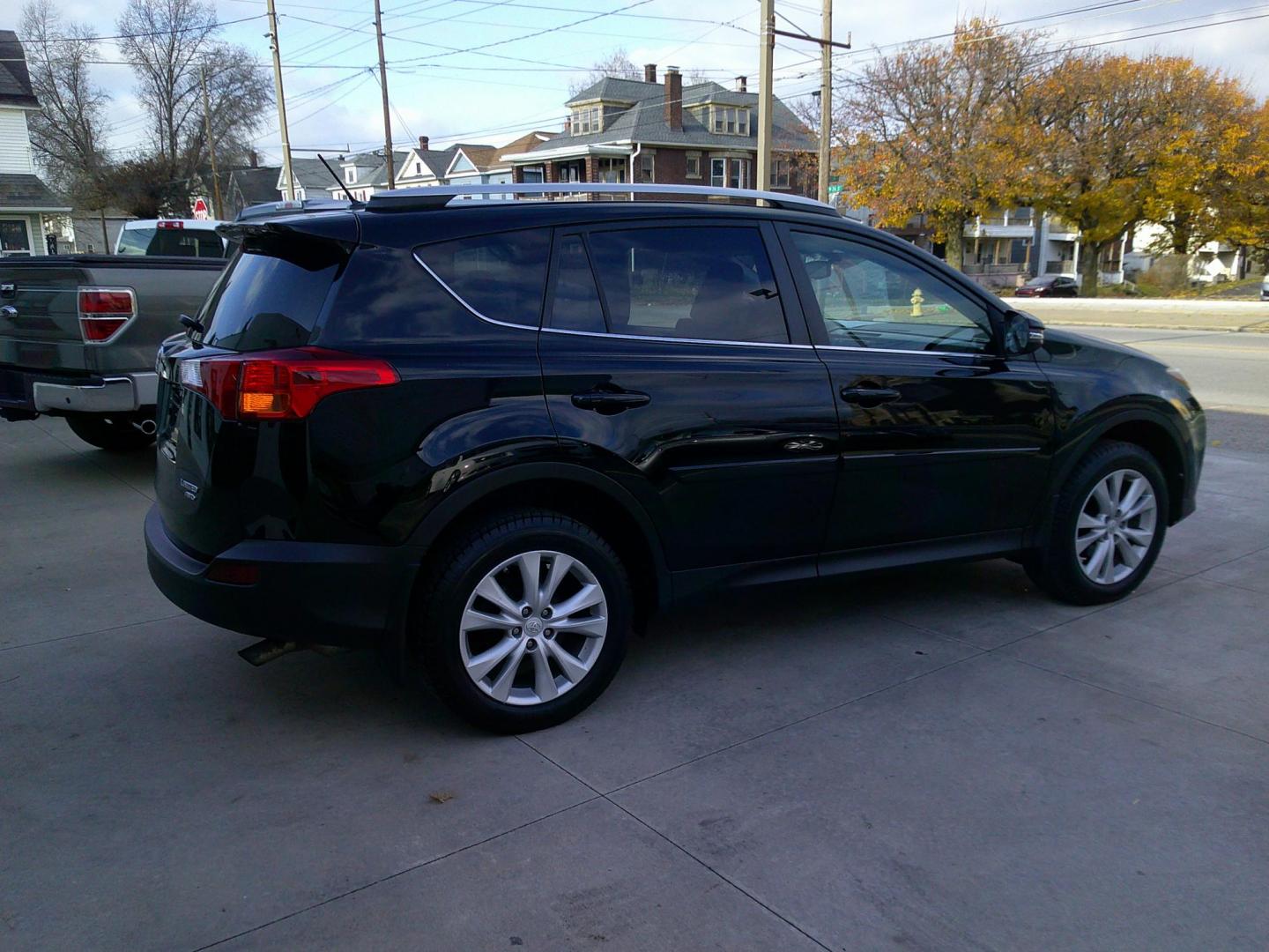 2013 Black Crystal Pearlcoat /Jet Black Toyota RAV4 Limited AWD (2T3DFREV0DW) with an 2.5L L4 DOHC 16V engine, 6-Speed Automatic transmission, located at 827 W 26th Street, Erie, PA, 16508, (814) 455-3401, 42.105431, -80.090942 - Thanks for looking at our accident free two owner new Toyota trade. This is the Limited model with lots of factory options including all wheel drive, heated leather front seats, power sunroof, back up camera, navigation, blind spot monitor, memory seat, just to name a few and lots more. No need to - Photo#3