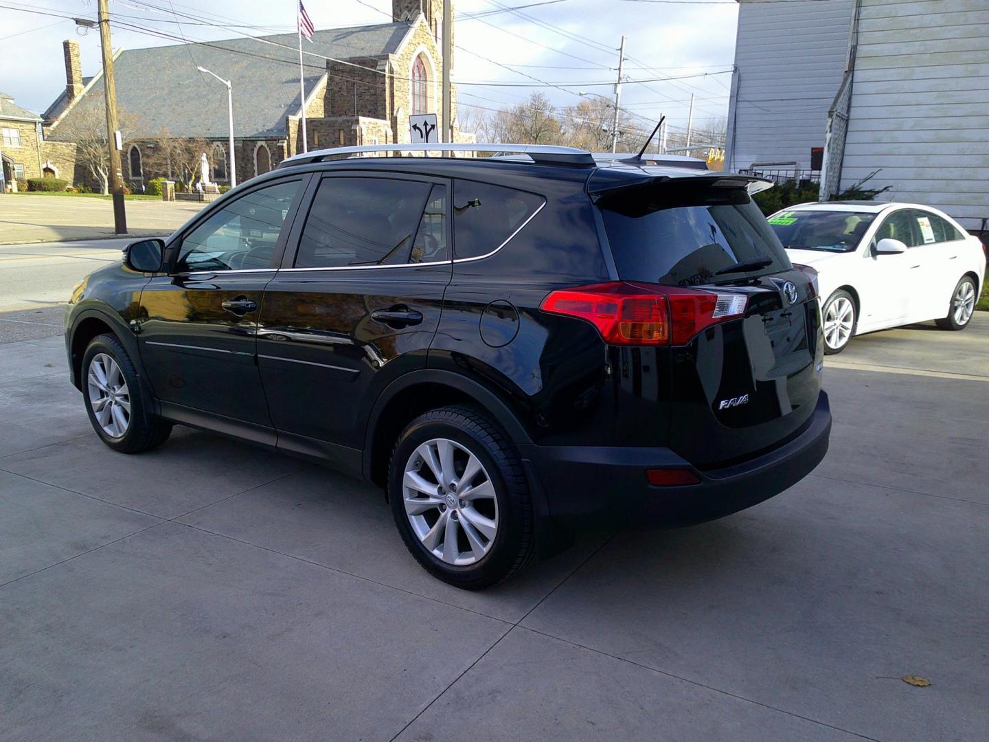 2013 Black Crystal Pearlcoat /Jet Black Toyota RAV4 Limited AWD (2T3DFREV0DW) with an 2.5L L4 DOHC 16V engine, 6-Speed Automatic transmission, located at 827 W 26th Street, Erie, PA, 16508, (814) 455-3401, 42.105431, -80.090942 - Thanks for looking at our accident free two owner new Toyota trade. This is the Limited model with lots of factory options including all wheel drive, heated leather front seats, power sunroof, back up camera, navigation, blind spot monitor, memory seat, just to name a few and lots more. No need to - Photo#5