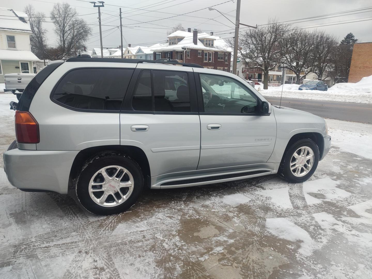 2007 Moon Dust /Jet Black GMC Envoy Denali 4WD (1GKET63M172) with an 5.3L V8 OHV 16V engine, 4-Speed Automatic Overdrive transmission, located at 827 W 26th Street, Erie, PA, 16508, (814) 455-3401, 42.105431, -80.090942 - Thanks for looking at our one owner like new rust-free SUV. This is the Denali model with the 5.3 V-8, four-wheel drive, leather seating, heated front seats, power sunroof, navigation, rear entertainment and lots more. This SUV is in like new condition with no rust and a like new nonsmoker interior. - Photo#3