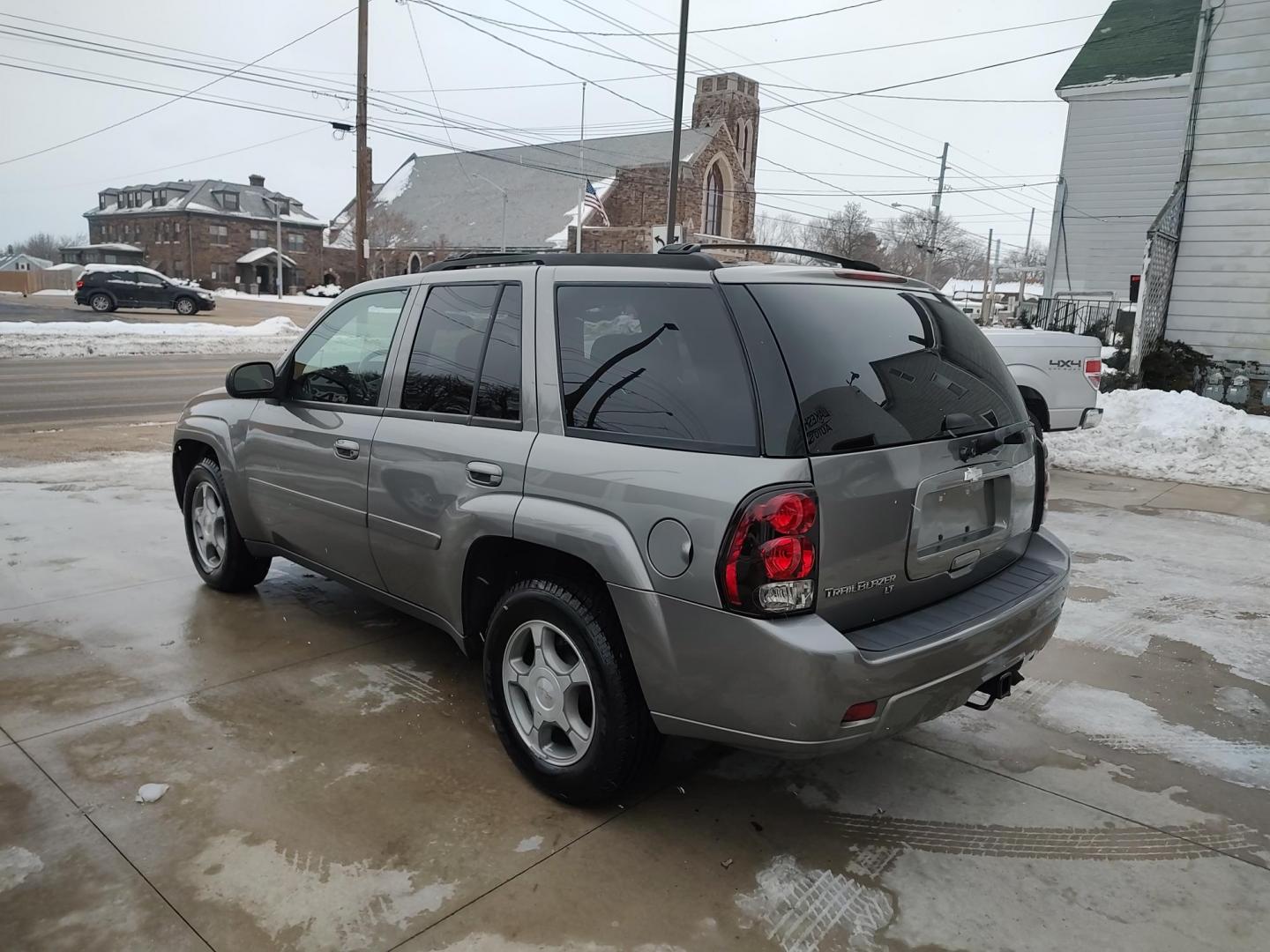 2009 Graystone Metallic /Graphite Chevrolet TrailBlazer LT 4WD (1GNDT33SX92) with an 4.2L L6 DOHC 24V engine, 4-Speed Automatic transmission, located at 827 W 26th Street, Erie, PA, 16508, (814) 455-3401, 42.105431, -80.090942 - Thanks for looking at our super low mileage accident-free new Chevy trade. This is the LT model with four-wheel drive, power sunroof and drivers seat, trailer tow package, both keys and remotes, the factory window sticker, the owner's manuals plus it comes with Weathertech floor mats and the factory - Photo#4