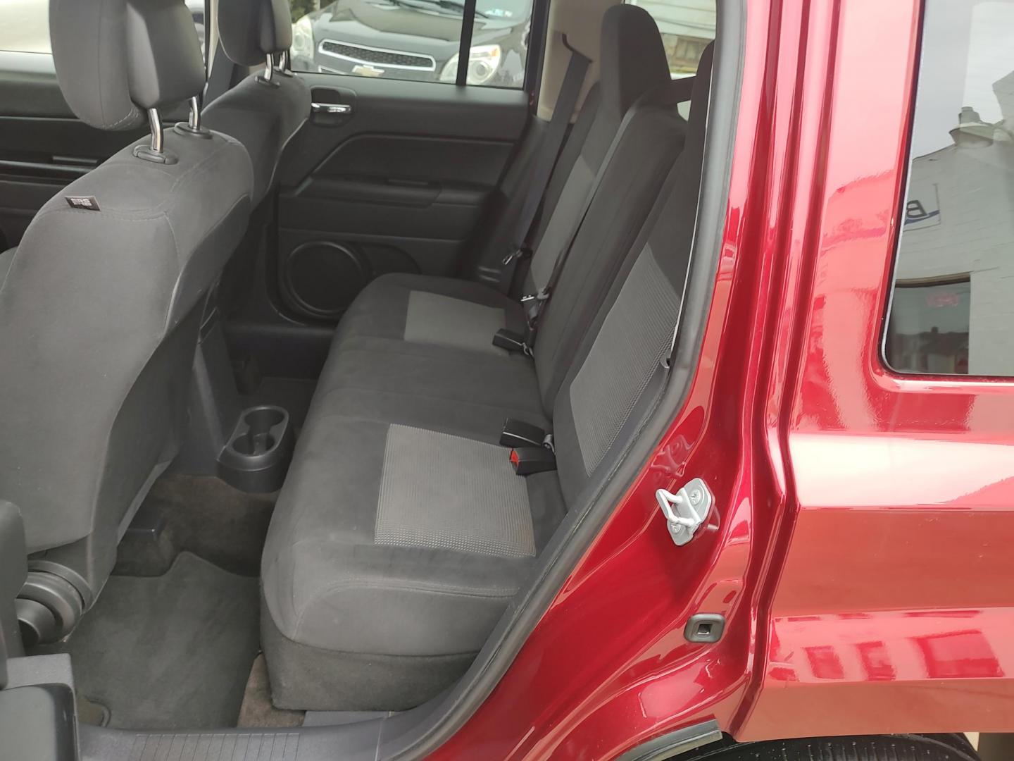 2014 Deep cherry Red Cyrstal Pearl Coat /Graphite Jeep Patriot Latitude 4WD (1C4NJRFB1ED) with an 2.4L L4 DOHC 16V engine, 4-Speed Automatic transmission, located at 827 W 26th Street, Erie, PA, 16508, (814) 455-3401, 42.105431, -80.090942 - Thanks for looking at our low mileage rust and accident-free new Jeep trade. This is the Latitude model with four-wheel drive, heated seats and lots more including a rust-free exterior as well as a like new nonsmoker interior. A full service was just done in our service department with new Pa state - Photo#19