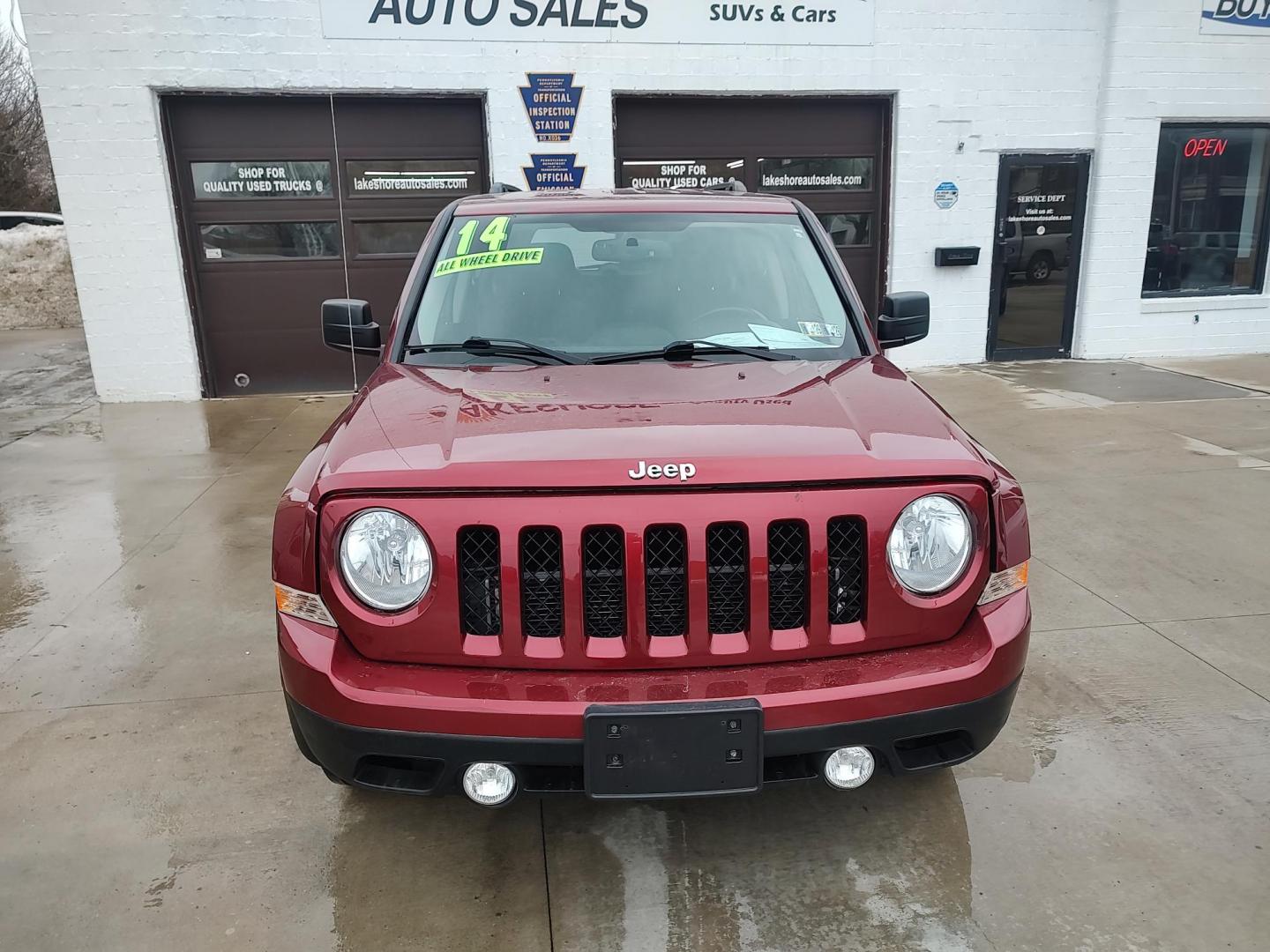 2014 Deep cherry Red Cyrstal Pearl Coat /Graphite Jeep Patriot Latitude 4WD (1C4NJRFB1ED) with an 2.4L L4 DOHC 16V engine, 4-Speed Automatic transmission, located at 827 W 26th Street, Erie, PA, 16508, (814) 455-3401, 42.105431, -80.090942 - Thanks for looking at our low mileage rust and accident-free new Jeep trade. This is the Latitude model with four-wheel drive, heated seats and lots more including a rust-free exterior as well as a like new nonsmoker interior. A full service was just done in our service department with new Pa state - Photo#1