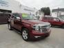 2016 Limited Addiction Red /Coco/Dune Chevrolet Tahoe LTZ 4WD (1GNSKCKC0GR) with an 5.3L V8 OHV 16V engine, 6-Speed Automatic transmission, located at 827 W 26th Street, Erie, PA, 16508, (814) 455-3401, 42.105431, -80.090942 - Thanks for looking at our super clean rust and accident-free new GMC trade. This is the LTZ top of the line model for the 2016 model year, which comes with lots of options including heated and cooled leather front seats, heated second row buckets, power sunroof, passive entry, power sunroof, power t - Photo#0