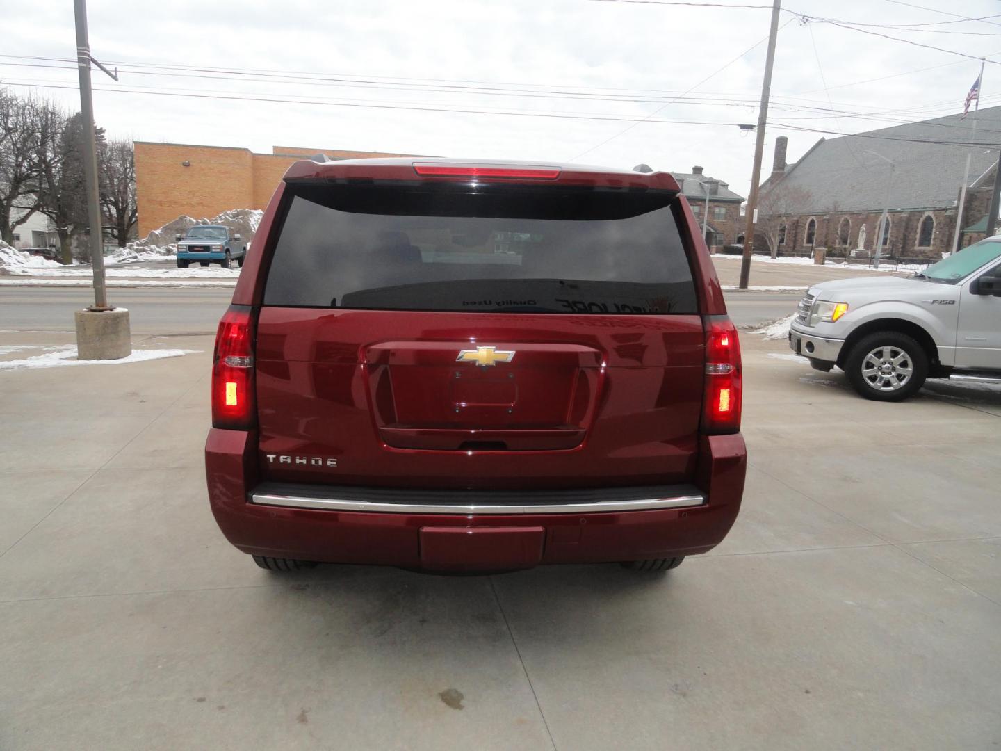 2016 Limited Addiction Red /Coco/Dune Chevrolet Tahoe LTZ 4WD (1GNSKCKC0GR) with an 5.3L V8 OHV 16V engine, 6-Speed Automatic transmission, located at 827 W 26th Street, Erie, PA, 16508, (814) 455-3401, 42.105431, -80.090942 - Thanks for looking at our super clean rust and accident-free new GMC trade. This is the LTZ top of the line model for the 2016 model year, which comes with lots of options including heated and cooled leather front seats, heated second row buckets, power sunroof, passive entry, power sunroof, power t - Photo#4