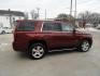 2016 Limited Addiction Red /Coco/Dune Chevrolet Tahoe LTZ 4WD (1GNSKCKC0GR) with an 5.3L V8 OHV 16V engine, 6-Speed Automatic transmission, located at 827 W 26th Street, Erie, PA, 16508, (814) 455-3401, 42.105431, -80.090942 - Thanks for looking at our super clean rust and accident-free new GMC trade. This is the LTZ top of the line model for the 2016 model year, which comes with lots of options including heated and cooled leather front seats, heated second row buckets, power sunroof, passive entry, power sunroof, power t - Photo#3