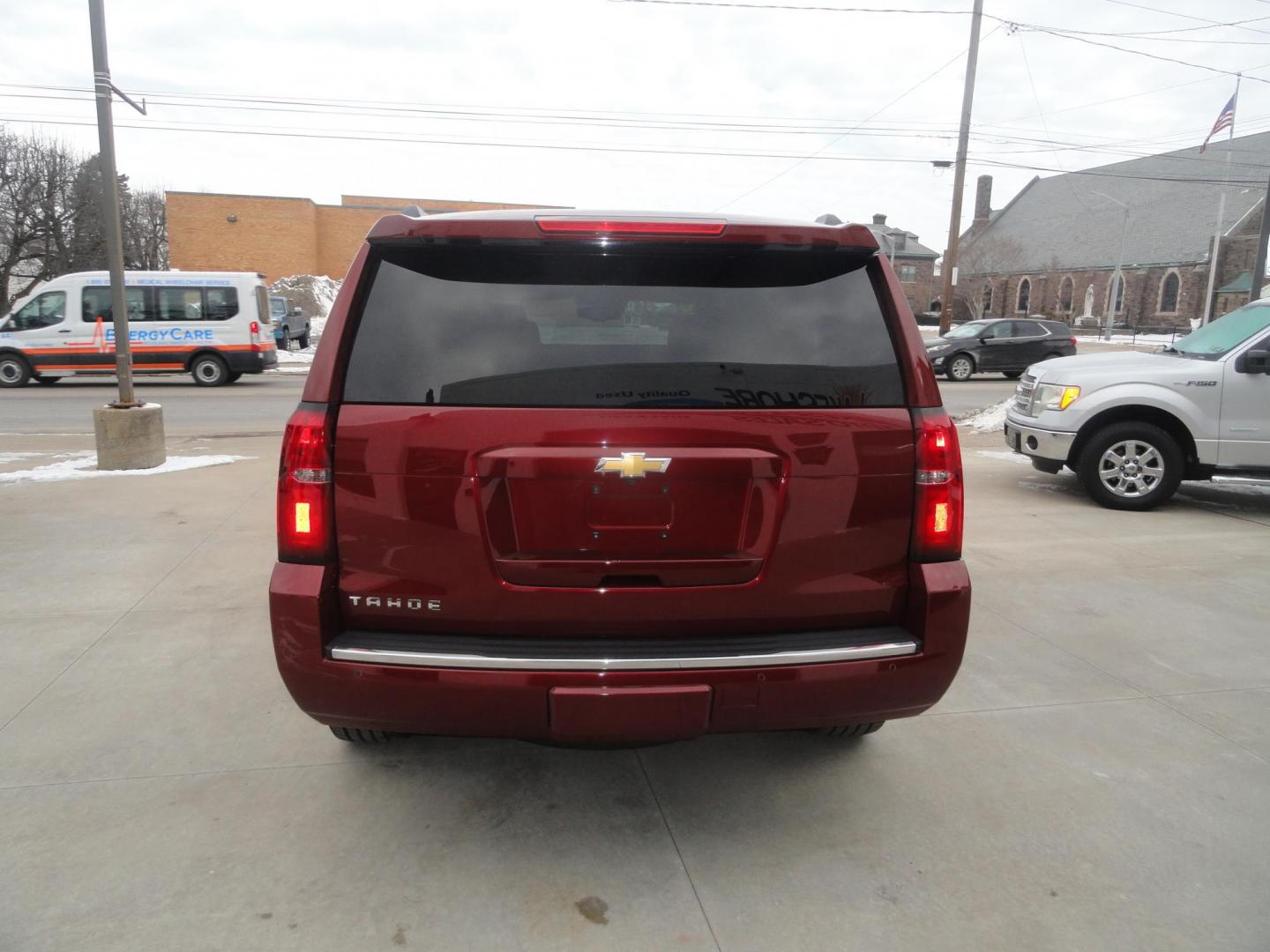 2016 Limited Addiction Red /Coco/Dune Chevrolet Tahoe LTZ 4WD (1GNSKCKC0GR) with an 5.3L V8 OHV 16V engine, 6-Speed Automatic transmission, located at 827 W 26th Street, Erie, PA, 16508, (814) 455-3401, 42.105431, -80.090942 - Thanks for looking at our super clean rust and accident-free new GMC trade. This is the LTZ top of the line model for the 2016 model year, which comes with lots of options including heated and cooled leather front seats, heated second row buckets, power sunroof, passive entry, power sunroof, power t - Photo#5