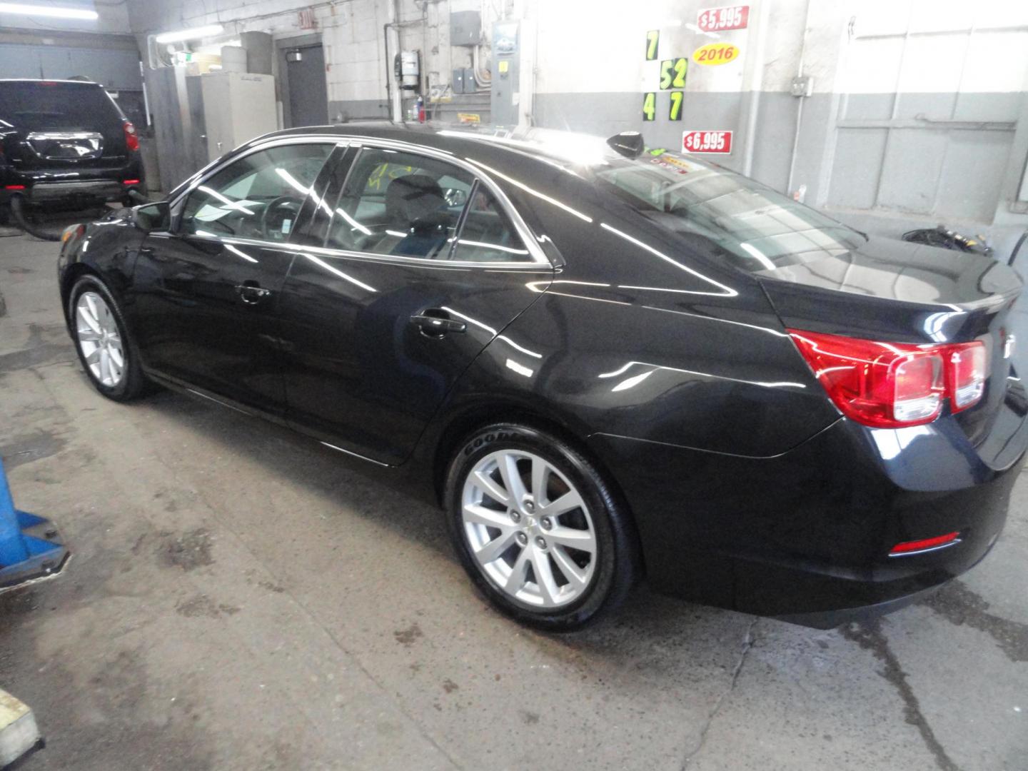 2013 Carbon Flash /Graphite Chevrolet Malibu 2LT (1G11E5SAXDF) with an 2.5L L4 DOHC 16V engine, 6-Speed Automatic transmission, located at 827 W 26th Street, Erie, PA, 16508, (814) 455-3401, 42.105431, -80.090942 - Thanks for looking at our low mileage, rust and accident-free recent arrival. This is the 2LT model with power drivers and passenger seat, factory remote start ,the owner's manuals and factory floor mats. A full service was just completed in our service department with new Pa state and emissions ins - Photo#5