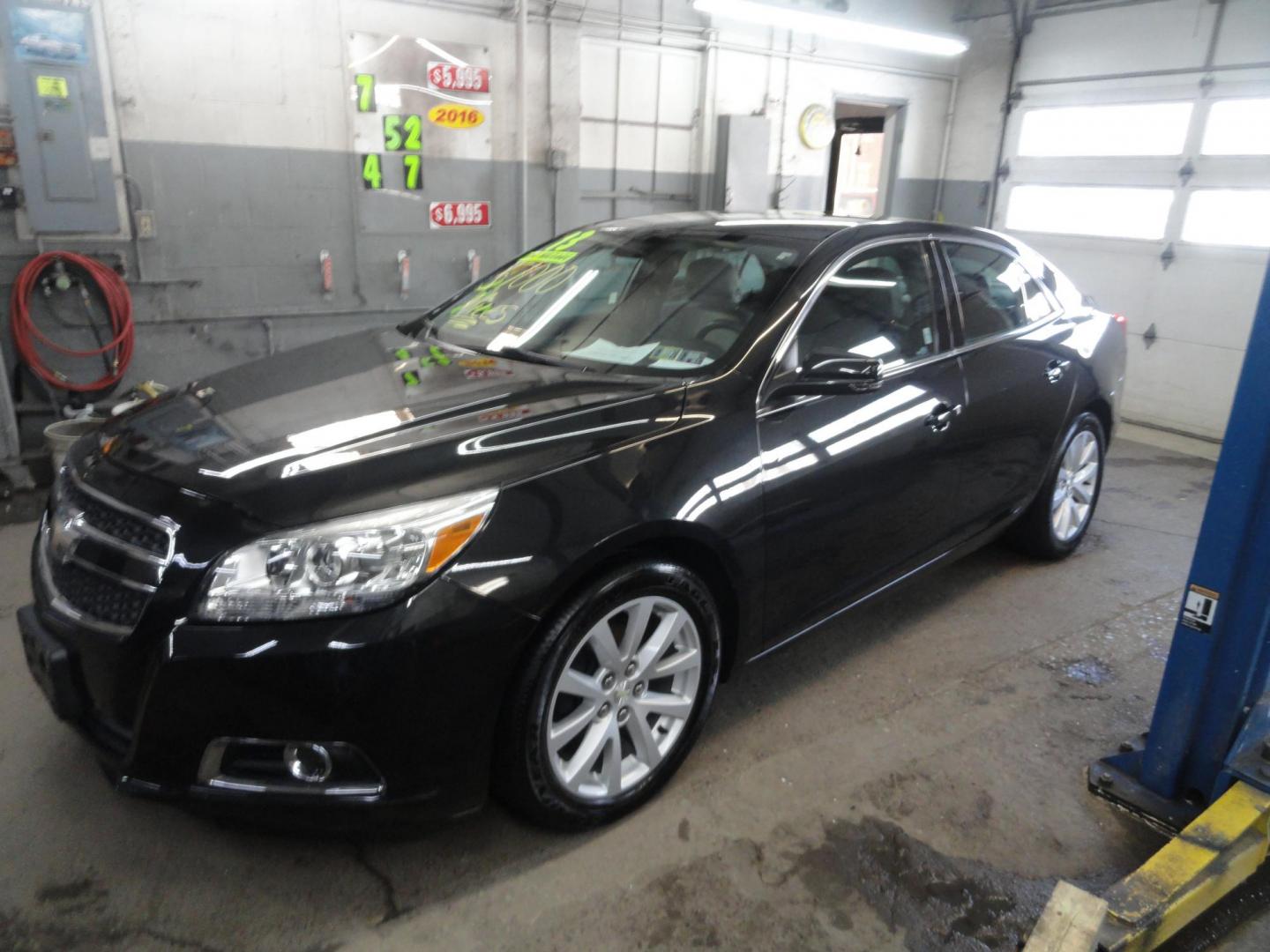 2013 Carbon Flash /Graphite Chevrolet Malibu 2LT (1G11E5SAXDF) with an 2.5L L4 DOHC 16V engine, 6-Speed Automatic transmission, located at 827 W 26th Street, Erie, PA, 16508, (814) 455-3401, 42.105431, -80.090942 - Thanks for looking at our low mileage, rust and accident-free recent arrival. This is the 2LT model with power drivers and passenger seat, factory remote start ,the owner's manuals and factory floor mats. A full service was just completed in our service department with new Pa state and emissions ins - Photo#6