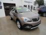 2015 Sandy Beach Metallic /Coco Dune Buick Encore Leather AWD (KL4CJGSBXFB) with an 1.4L L4 DOHC 16V TURBO engine, 6-Speed Automatic transmission, located at 827 W 26th Street, Erie, PA, 16508, (814) 455-3401, 42.105431, -80.090942 - Photo#0